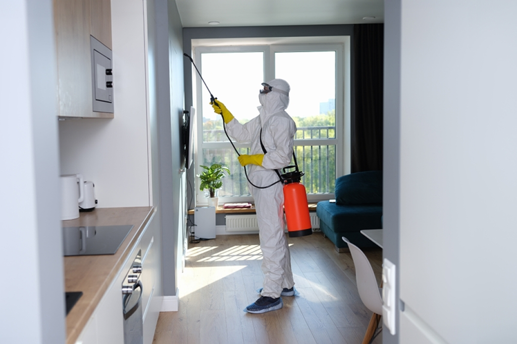 Pest Control Naperville team member completing pest treatment in Warrenville DuPage County